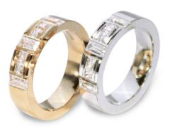 Vigselring Flemming Uziel Signo B077/B077V i 18 k guld med diamant.