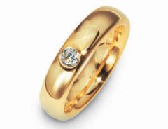 Vigselring Flemming Uziel Signo KB6284010 i 18 k guld med diamant.