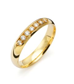 Vigselring Flemming Uziel Signo B004 i 18 k guld med diamanter.