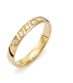 Vigselring Flemming Uziel Signo B019 i 18 k guld med diamanter.