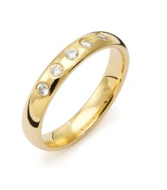 Vigselring Flemming Uziel Signo B028 i 18 k guld med diamanter.