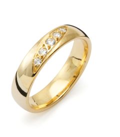 Vigselring Flemming Uziel Signo B030 i 18 k guld med diamanter.