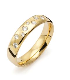 Vigselring Flemming Uziel Signo B033 i 18 k guld med diamanter.