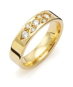 Vigselring Flemming Uziel Signo B051 i 18 k guld med diamant.