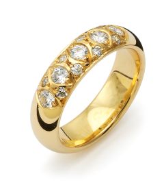 Vigselring Flemming Uziel Signo B053 i 18 k guld med diamant.