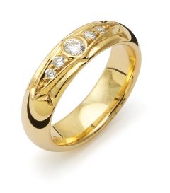 Vigselring Flemming Uziel Signo B076 i 18 k guld med diamant.