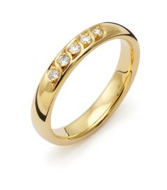 Vigselring Flemming Uziel Signo B628 i 18 k guld med diamant.